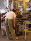 Inmates working in the machine tool shop