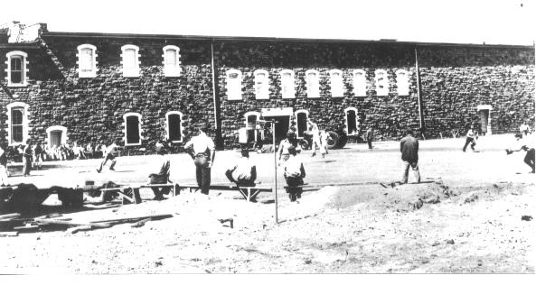 Inmate softball game in the recreation yard